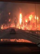 Taken from a dashboard camera of an evacuee evacuating Fort McMurray and heading south on 3rd May 2016